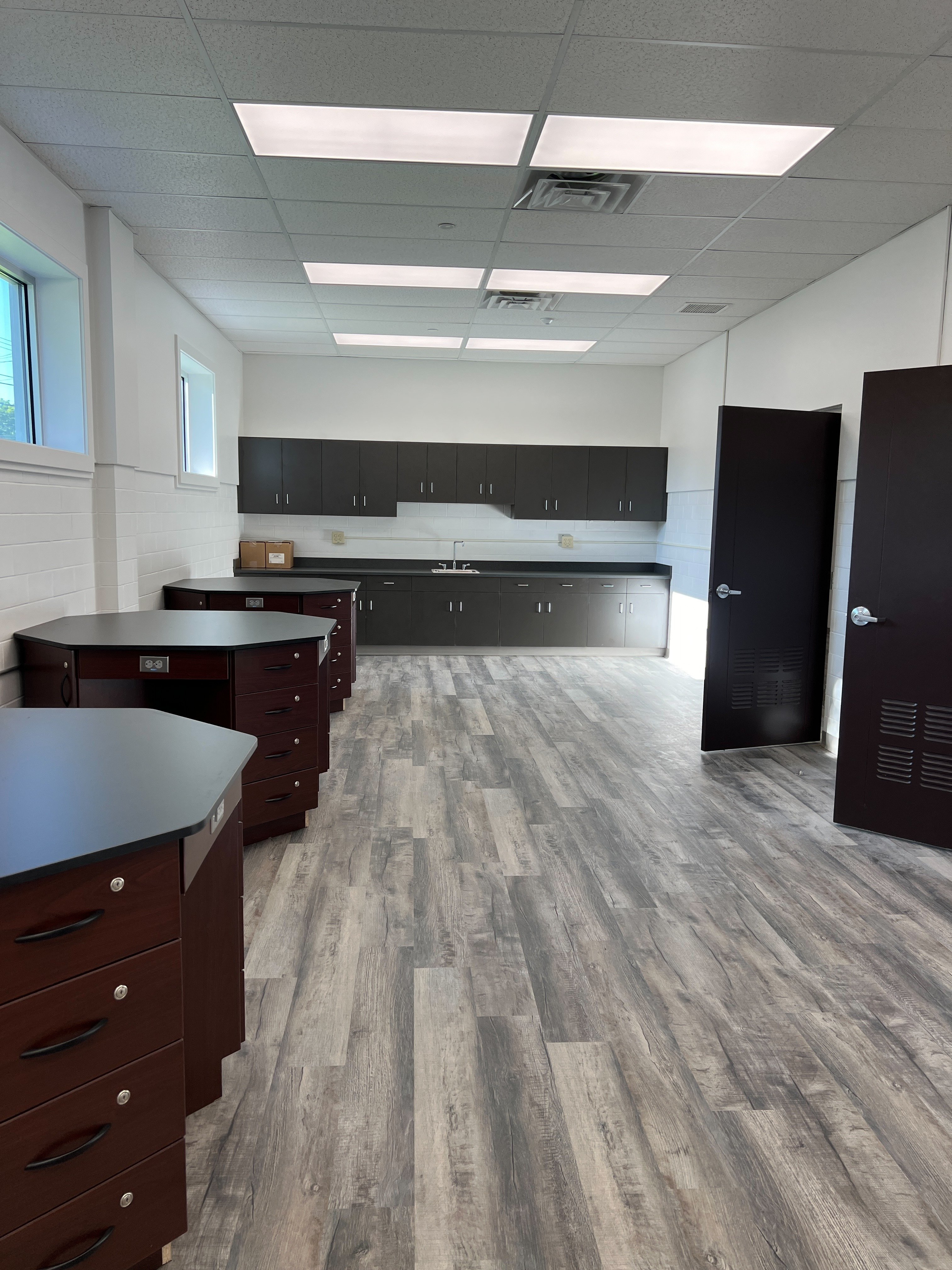MVCS interior building LVT flooring white walls science lab